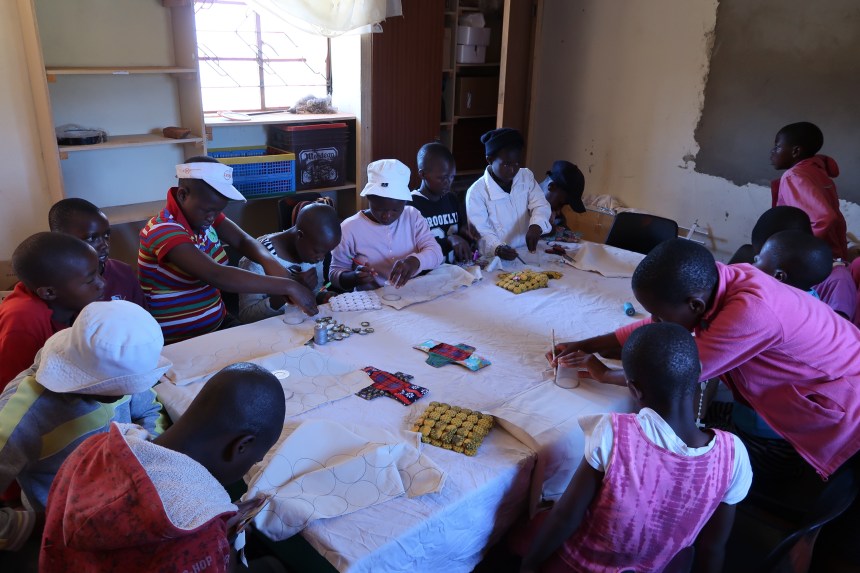 Malealea Development Trust's Young Women's Support Group, learning how to sew table mats and reusable sanitary pads, Malealea, Lesotho, Southern Africa, income generation