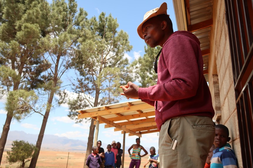 MDT Field Worker Tsotang Monyane makes a passionate point to the children at the Malealea Development Trust's Children's Day in Lesotho, Southern Africa