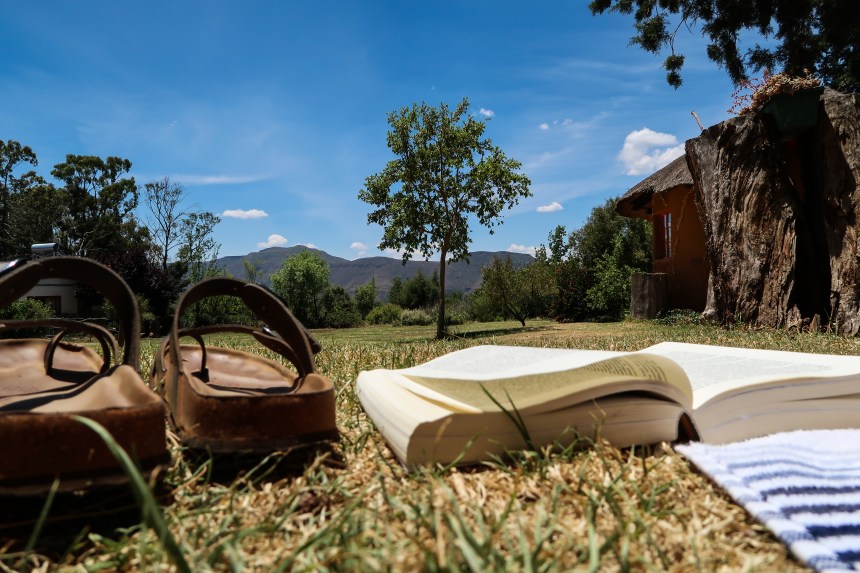 Books and Sun on the Malealea Lodge Grounds, photo by Kelly Benning