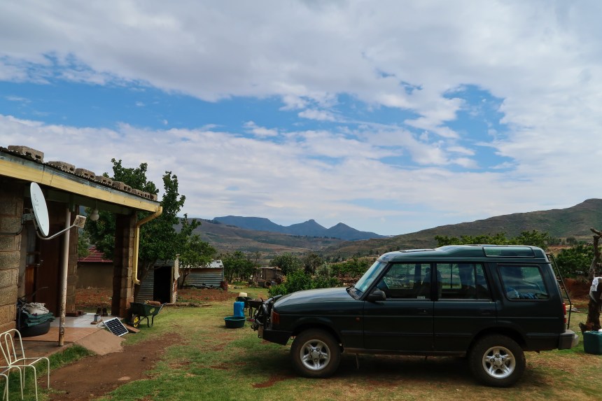 a Land Rover parked at a village home in Ha Raboletsi, Roma, Lesotho, Southern Africa, photo by Kelly Benning